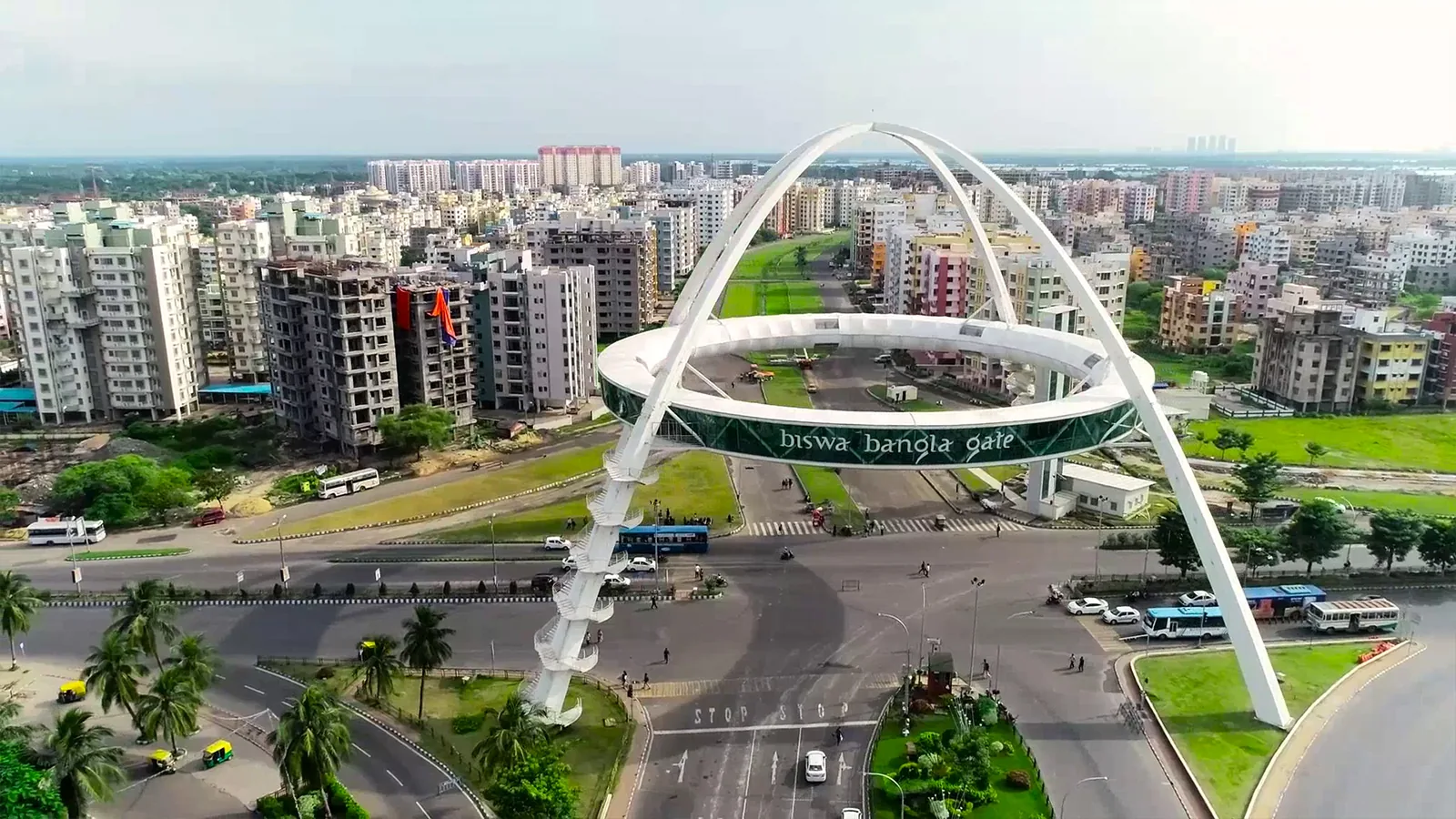 Wide view of Biswa Bangla Gate and surrounding New Town streets in Kolkata