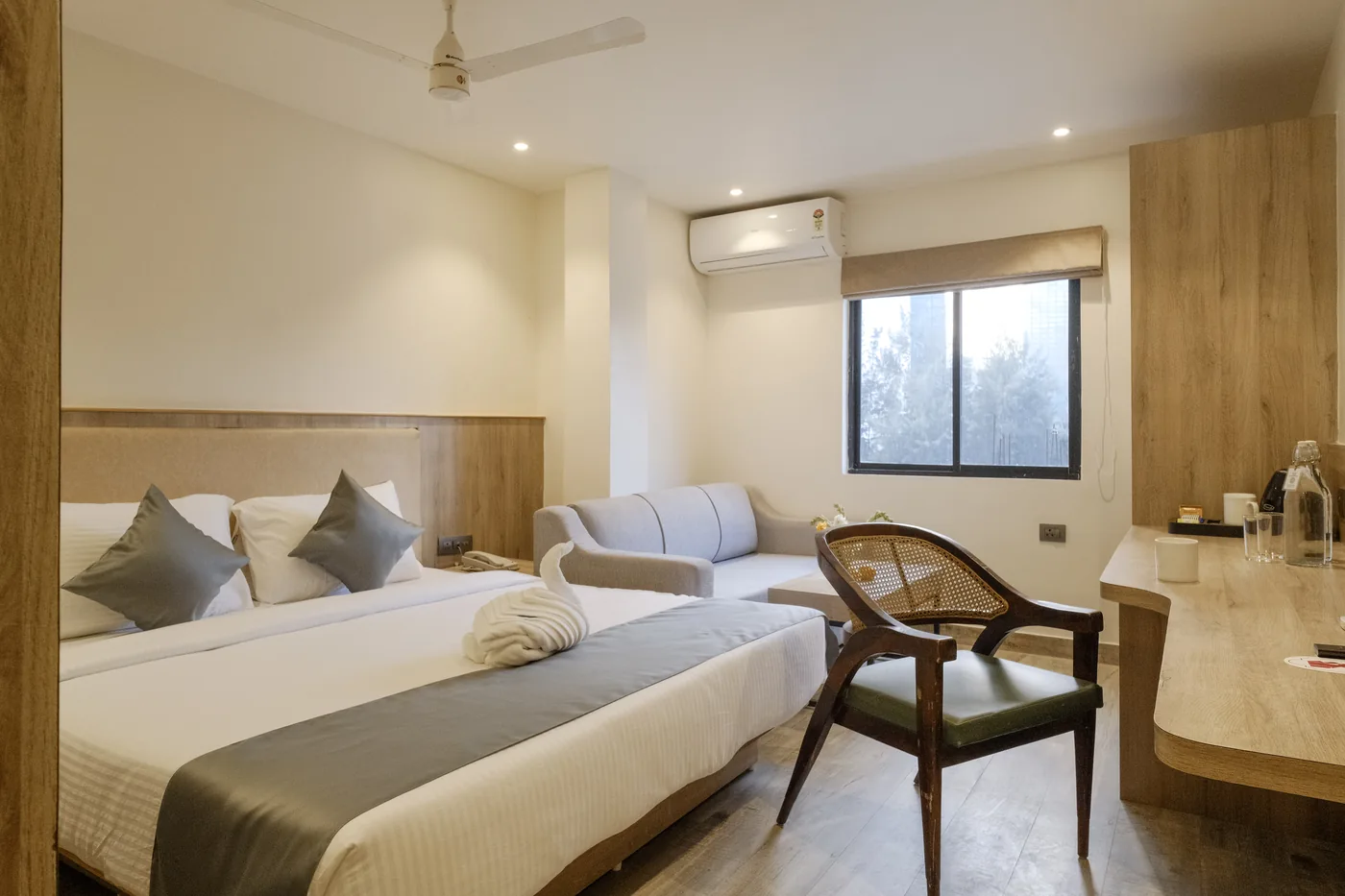 Executive Suite showing the double bed, sofa, chair and desk