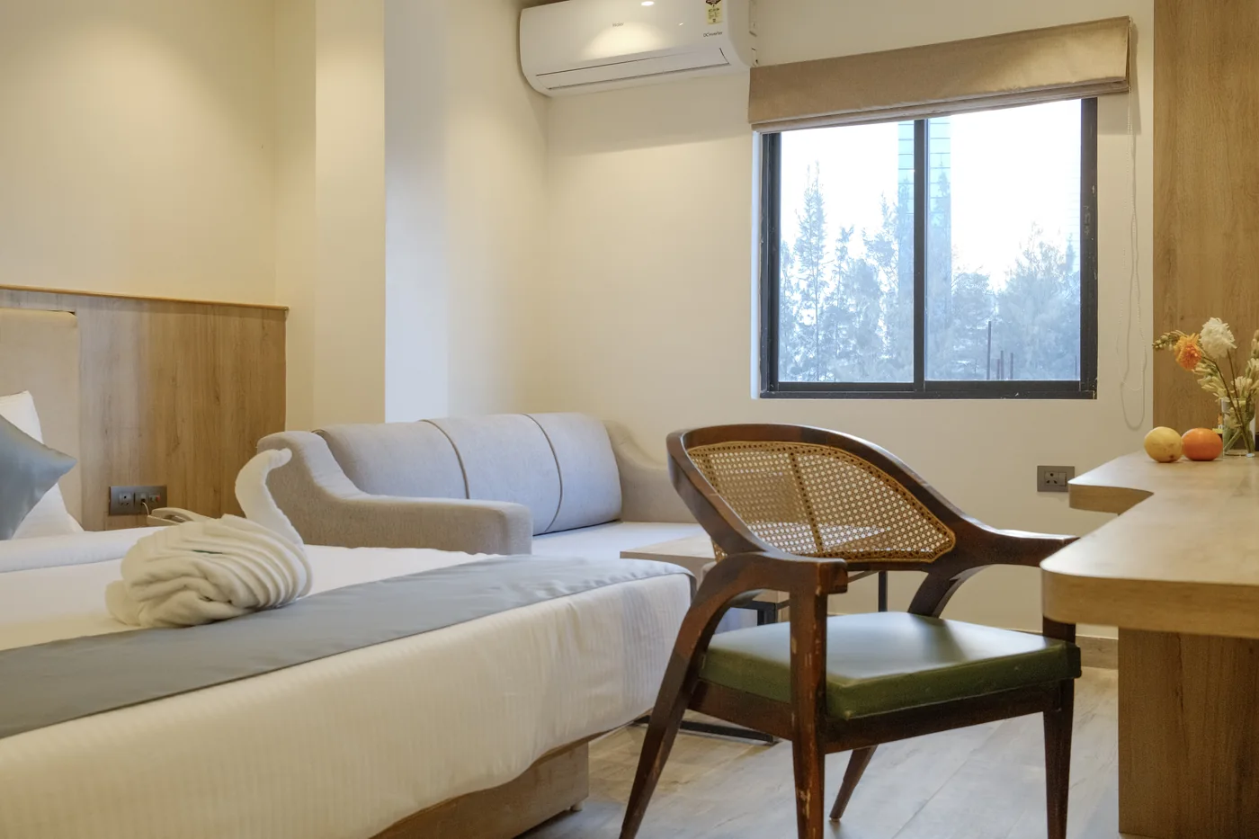 Executive Suite seating area and workspace beside the window
